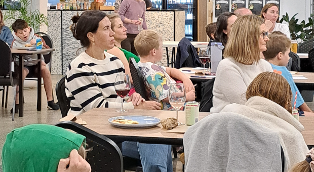 Parents, carers and students gather at Fair Play Kitchen as Rebecca Sparrow presents practical friendship advice during the Christ the King School seminar.