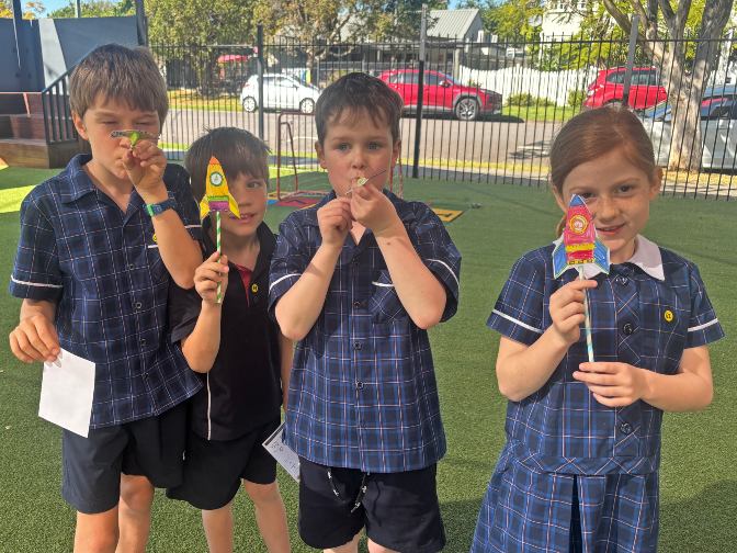 Year 2 students with their paper rockets at the CTK School STEM Day in Term 3